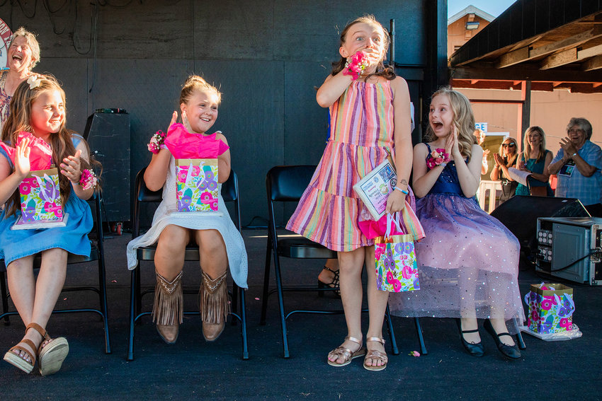 Emma Britton reacts to being named Little Miss Friendly in Agust 2022 on the Saloon Stage at the Southwest Washington Fairgrounds.