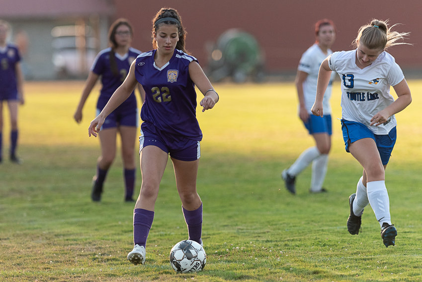 Kaiyah Sandridge gets upfield during the first half of Onalaska's game against Toutle Lake on Sept. 26.