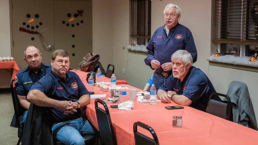 Lee Coumbs introduces two new Fire Commissioners for Riverside Fire Authority, Richard Mack and Buddy Lowre, during the Lewis County Fire Commissioners Association's quarterly meeting at the Lewis County Fire District 3 building in Mossyrock late least year.