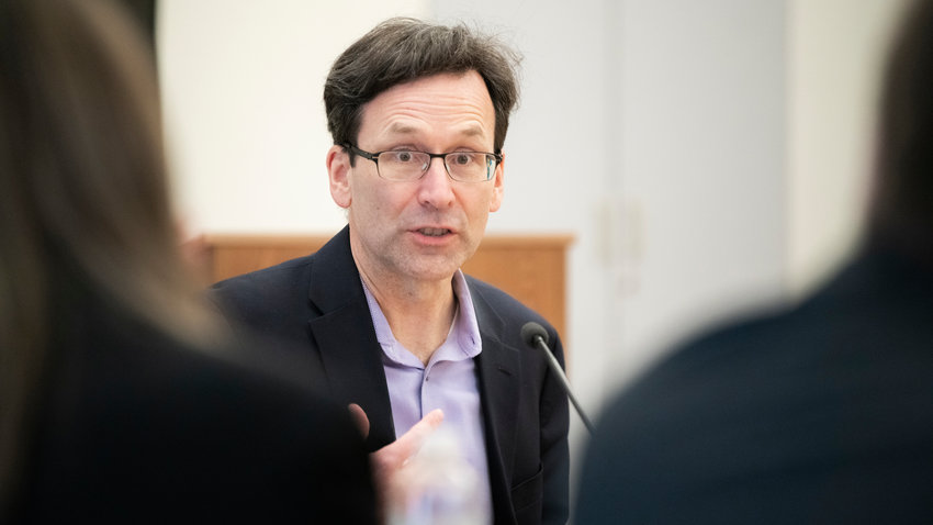 Attorney General Bob Ferguson talks to members of the press during a legislative meeting inside the John A. Cherberg building in Olympia last February.