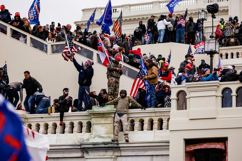 Pro-Trump supporters storm the U.S. Capitol following a rally with President Donald Trump on Jan. 6, 2021, in Washington, D.C. (Samuel Corum/Getty Images/TNS)
