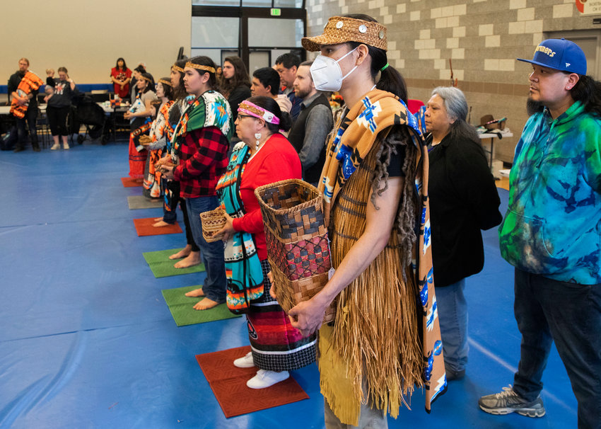 New master weavers Coby Higheagle and Peggy McCloud, gatherers &ldquo;Junior&rdquo; or Aholagana Komakhuk and &ldquo;William&rdquo; or Agugaluk Komakhuk, siblings Jack Kesler and Clara Kesler, and artist Jeycee Zepeda are welcomed into the Hazel Pete family at the Chehalis Tribe Community Center in Oakville on Saturday.