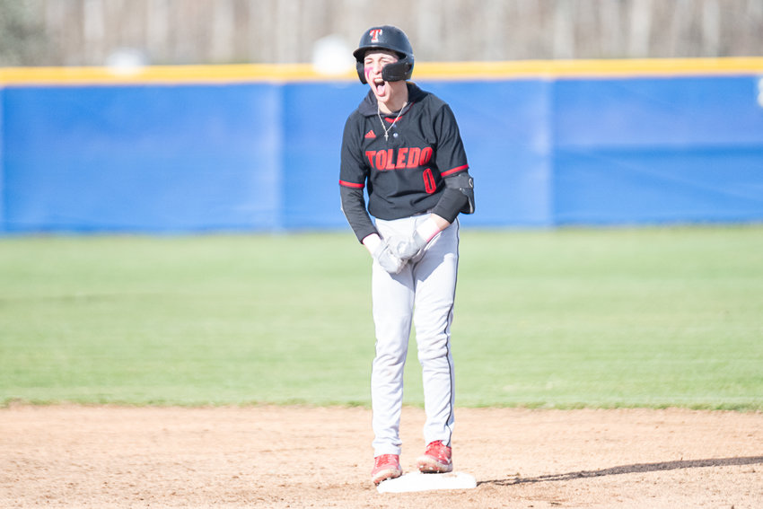 Rayder Stemkoski celebrates on second after his double to lead off the top of the ninth inning of Toledo's 5-4 win at Adna on April 12.