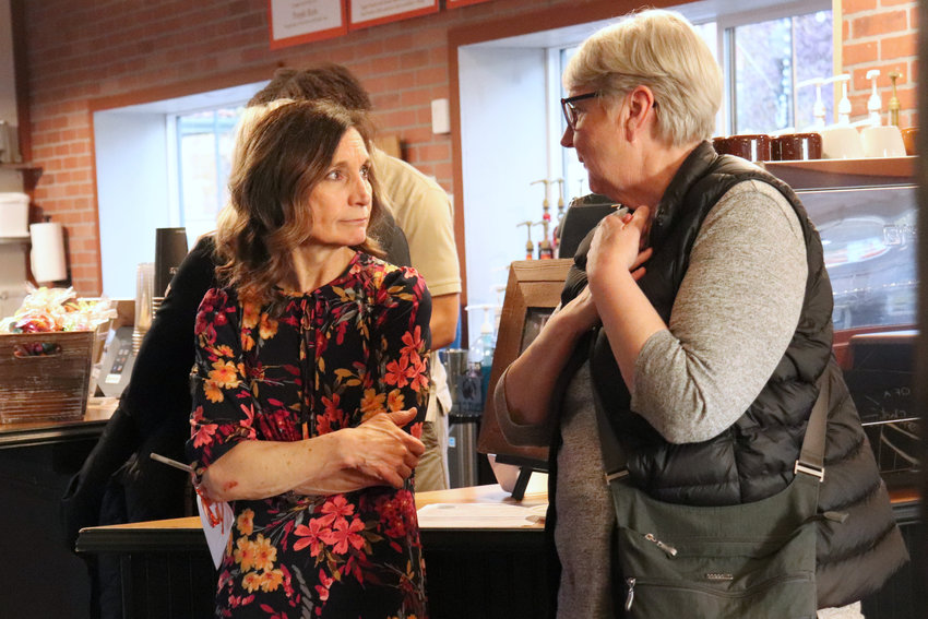Centralia School District Superintendent Lisa Grant mingles with community members at a Centralia Downtown Association Block Party at Dawn&rsquo;s Delectables in Centralia on Wednesday.