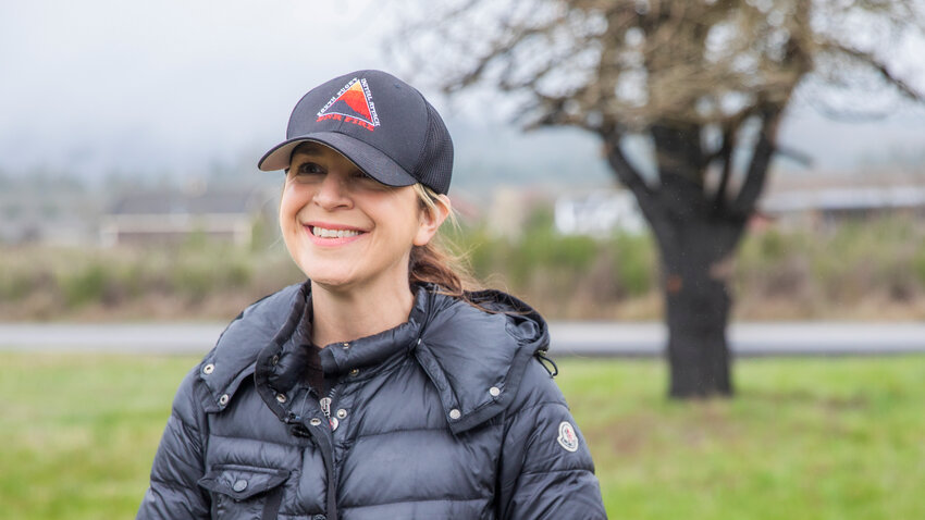 Commissioner of Public Lands Hilary Franz smiles while talking about wildfire readiness during an event along Mima Road Southwest in Olympia last April.