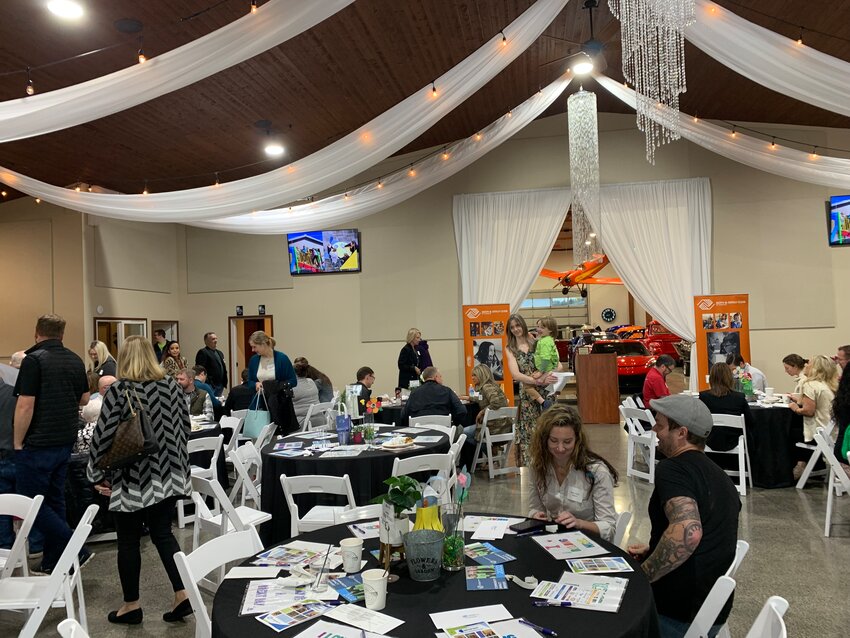 Attendees gather at the Jester Auto Museum during the &ldquo;2023 Most Important Meal of the Year&rdquo; event hosted by the Boys and Girls Club of Lewis County in Chehalis on Wednesday.