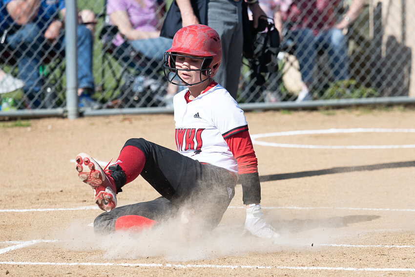 Quyn Norberg slides home safely during Toledo's game at Napavine on April 27.
