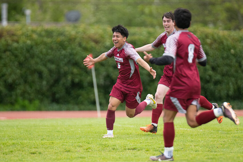 Israel Lopez Cruz celebrates his opening goal in the first half of W.F. West's 3-0 win over R.A. Long in the first round of the 2A District 4 tournament, on May 6 in Chehalis.