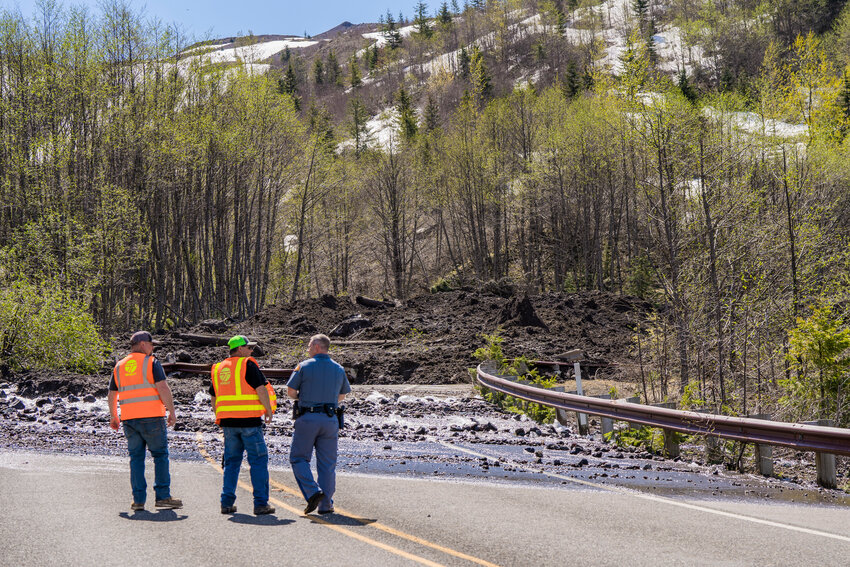 Washington State Department of Transportation and members of the Washington State Patrol respond to the scene of a landslide along Spirit Lake Highway on Monday, May 15.