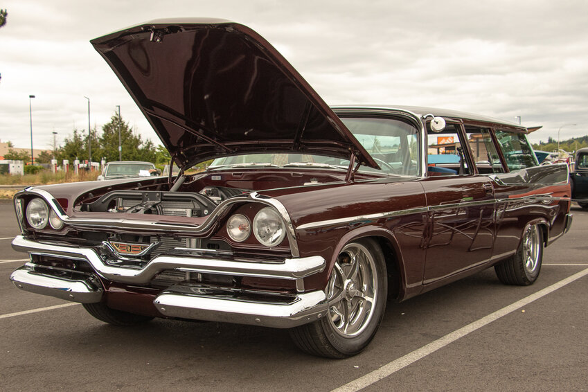 Darryl Tinnerstet won best in show Saturday at the Walmart Supercenter Seattle Children's Hospital Benefit Car Show with his 1957 Dodge Station Wagon.