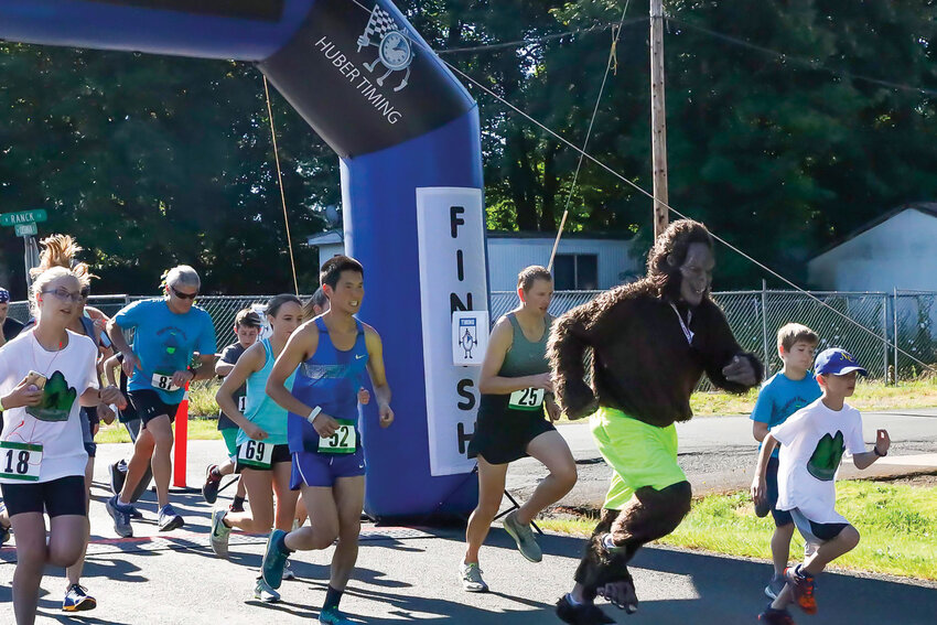Bigfoot joins a group of runners at the start of the 5K and 10K Bigfoot Fun Run at a previous Yacolt Rendezvous Days. This year&rsquo;s run is scheduled to take place on Saturday, July 1.