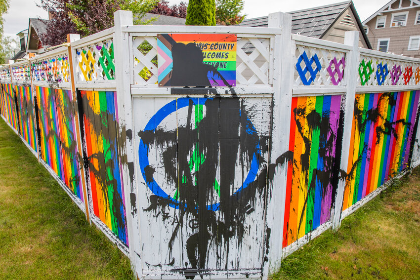 Black paint is seen splattered across the &ldquo;Friendship Fence,&rdquo; in Chehalis on Monday, June 26.