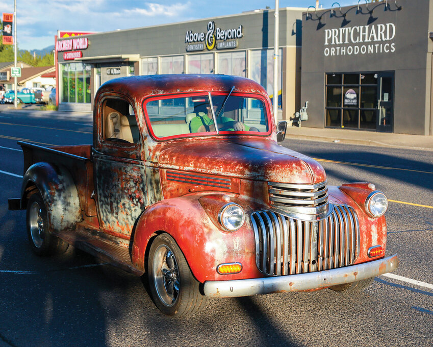 A classic Chevrolet pick-up truck travels on Main Street in Old Town Battle Ground during a cruise that took place last year.