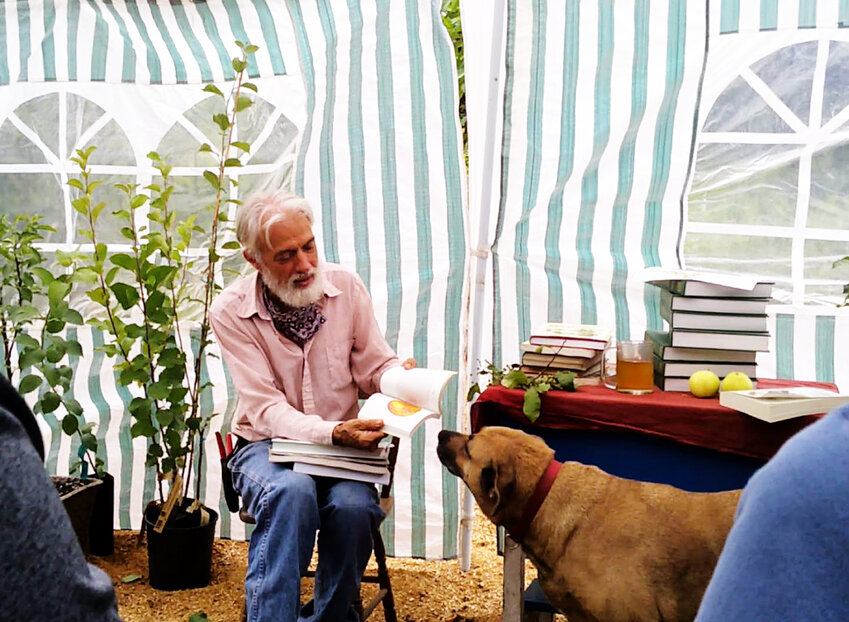 Burnt Ridge Nursery owner and founder Michael Dolan discusses apples in this photo provided by the business.