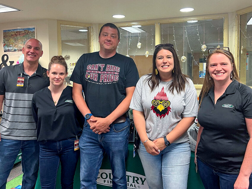 Starting on the left, Country Financial Agent Dane Bauersfeld, Country Financial Associate Agent LaDonna Stacey, Winlock Elementary Principal Andy Justice, Winlock Elementary Assistant Principal Ashlie Auckland and Country Financial Agent Jennifer Penfold pose for a photo, courtesy of Country Financial.