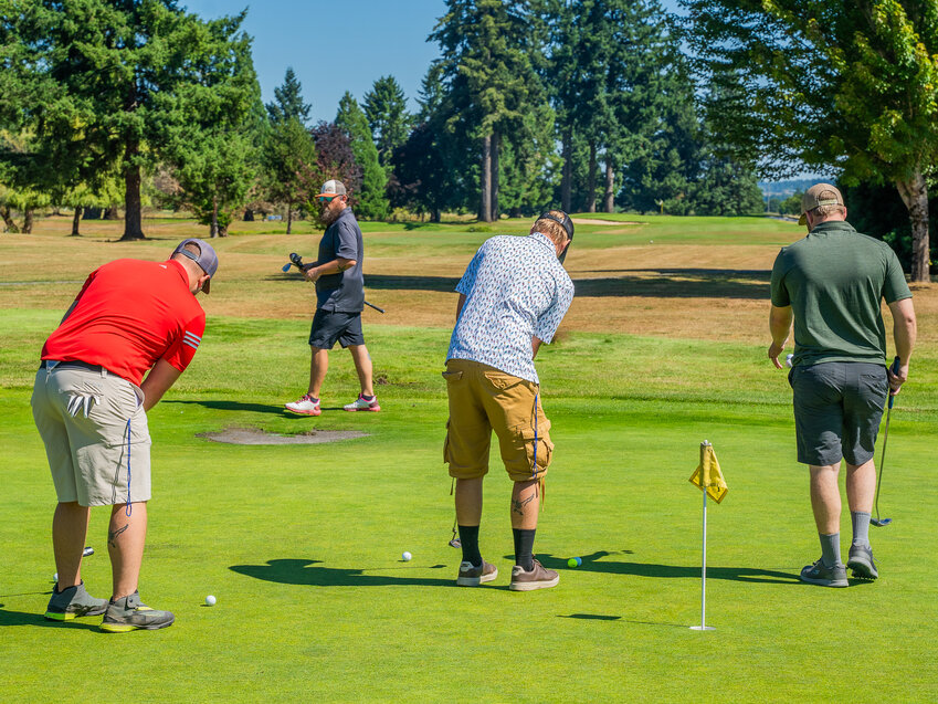 Golfers warm up before the Visiting Nurses Annual Golf Tournament Friday morning, July 14, 2023.