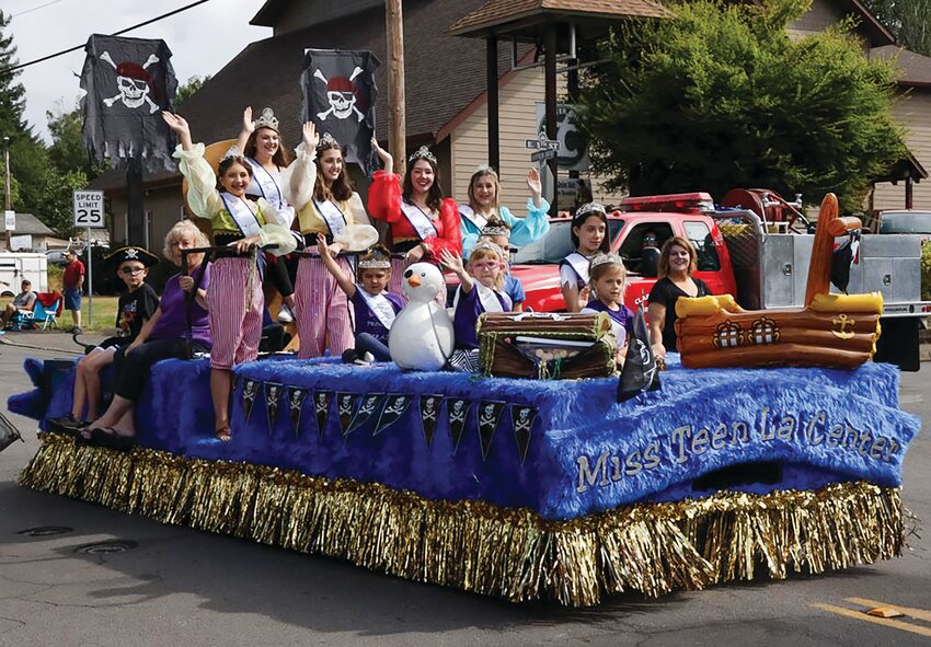Miss Teen La Center&rsquo;s float processes in La Center Our Days&rsquo; 2019 parade.