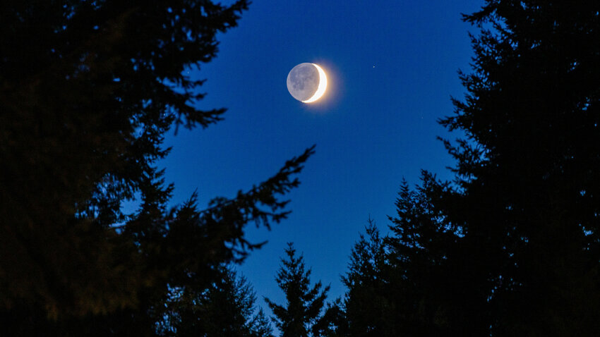 Sunlight reflects off the waxing crescent moon Friday night over Chehalis. To submit photos for potential publication in The Chronicle, email news@chronline.com.