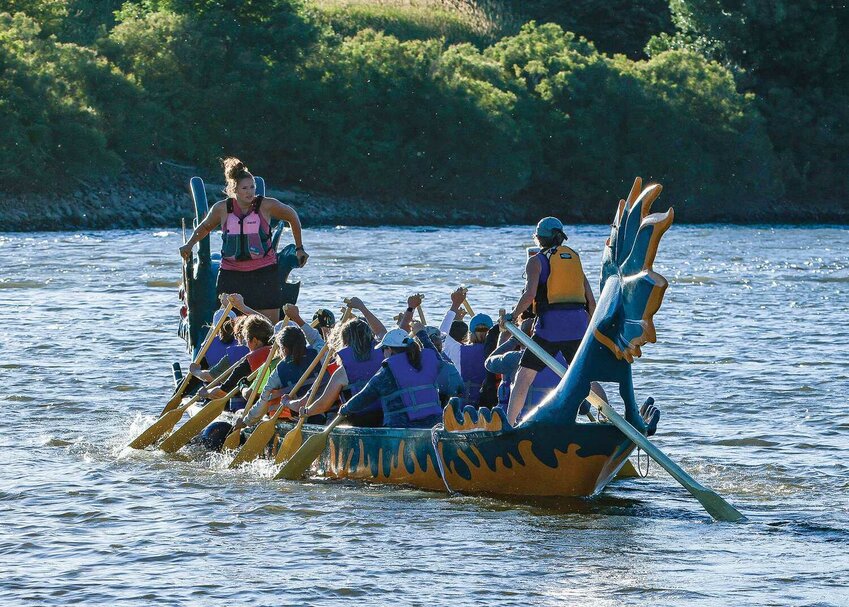 Paddlers leave the Ridgefield Marina on Thursday, June 29 for a weekly dragon boat paddle on the Lake River.