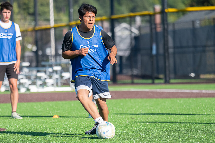 Leo Perez passes the ball to a teammate during the Centralia College men's soccer team's first practice on Aug. 2.