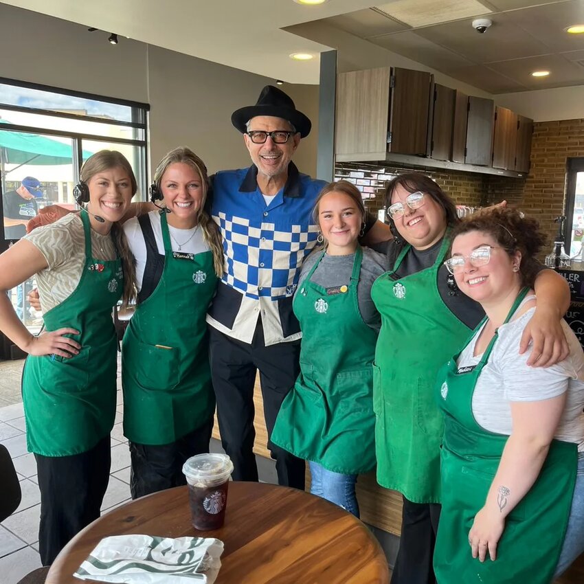 Actor and musician Jeff Goldbum poses with the staff of Starbucks in Chehalis Friday in this photo provided by Madison Amburgy, who is pictured at the far right.