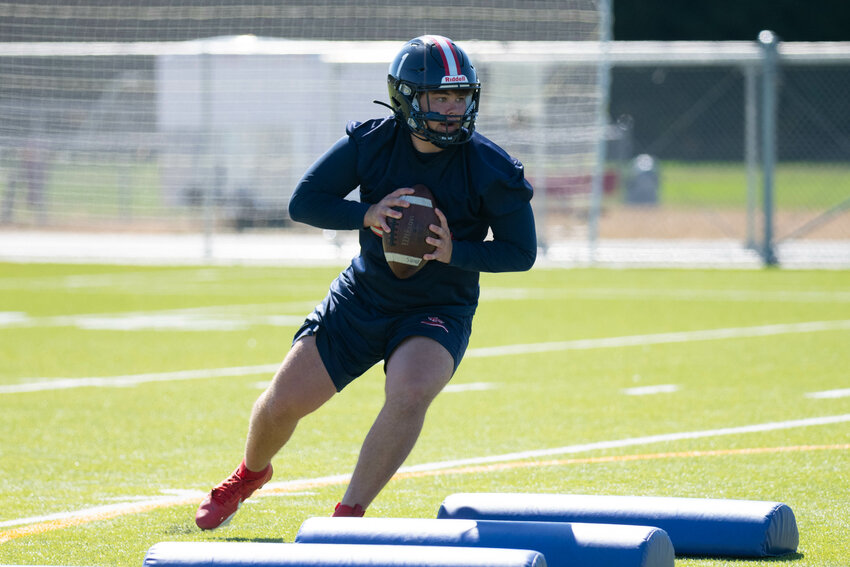Jaxsen Beck weaves through obstacles during a drill at Black Hills' practice on Friday, Aug. 18.