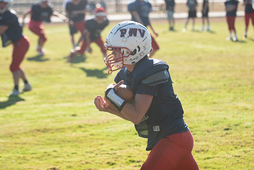 Blaine King quickly turns up field after catching a bubble screen during PWV's practice on Aug. 19.