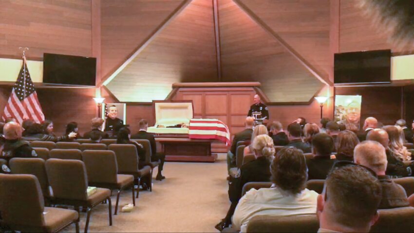 Battle Ground Police Chief Mike Fort speaks to those gathered for a memorial service for BGPD Sgt. Richard Kelly at Evergreen Memorial Gardens Aug. 19.