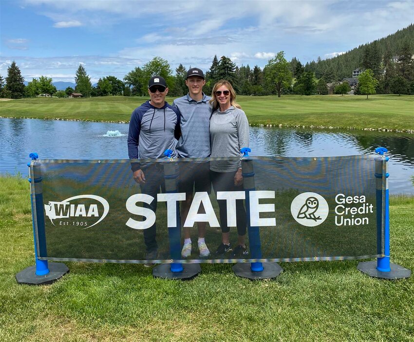 Former Woodland Athletic Director Paul Huddleston, left, with his son, Dane, and wife, Malinda, has accepted the position of dean of students for Cascadia Tech Academy.