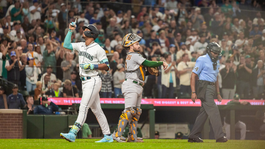 Julio Rodriguez gestures after hitting a home run during a 7-0 win over the Oakland A's Monday night in Seattle.