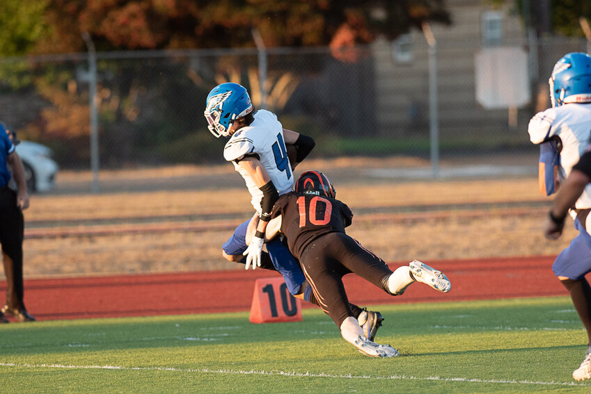 Landen Jenkins makes a touchdown-saving tackle during Centralia's matchup with Elma on Sep. 1.