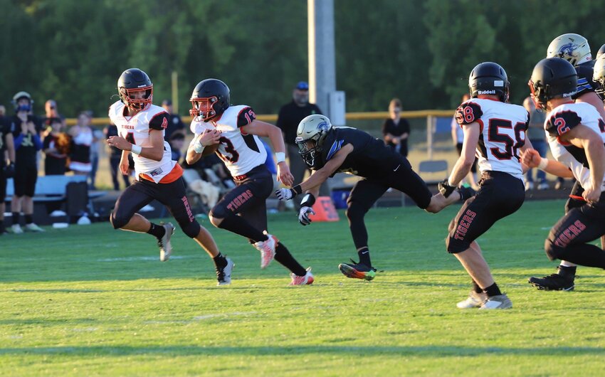 Conner Holmes hits the open field during Napavine's 59-6 win at Adna on Sept. 1.
