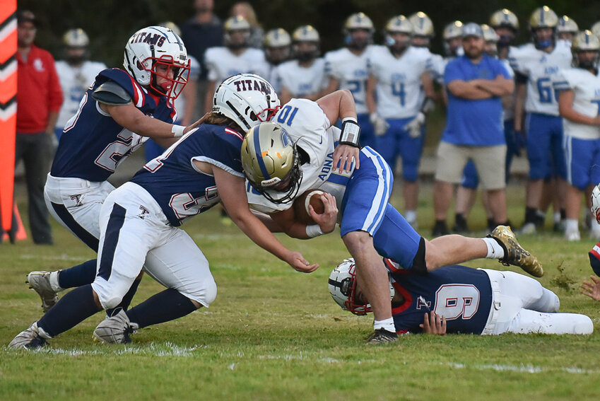 Liam Smaciarz trips up Lane Johnson on a goal line stand during PWV's 22-20 win over Adna on Sept. 8.