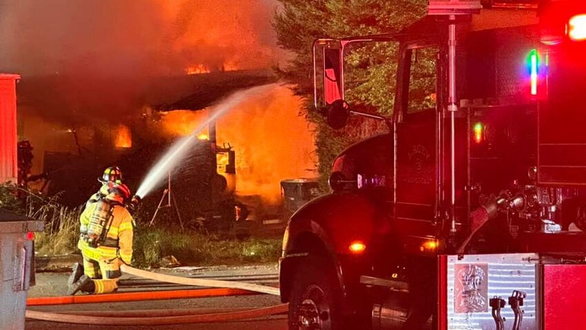 Lacey Fire District 3 crews fight a mobile home park fire Friday, Sept. 8, near Lacey.