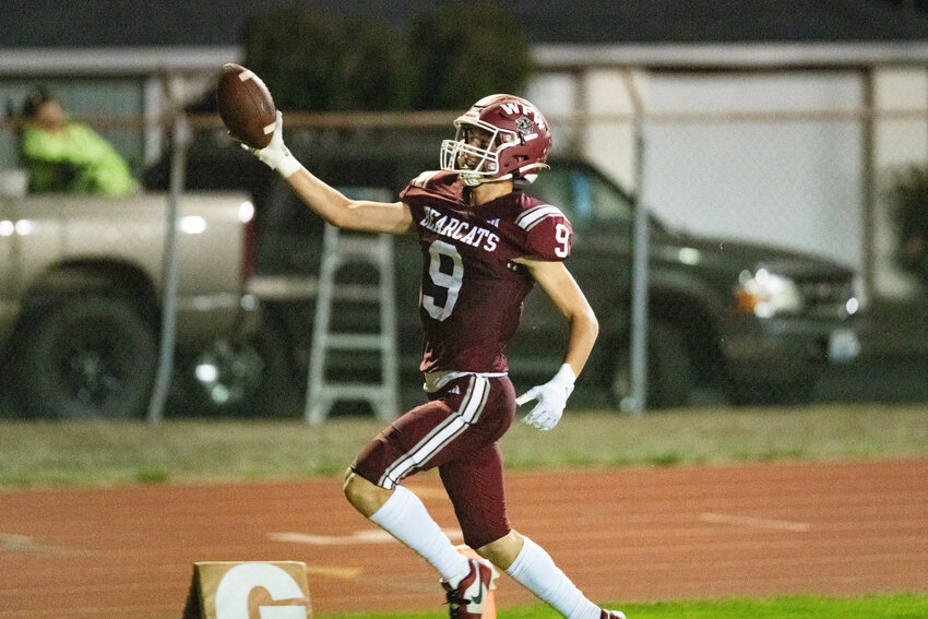 Connor Coleman celebrates on his way into the end zone on a 64-yard reverse to start the third quarter in W.F. West's 48-8 win over Black Hills on Sept. 22.