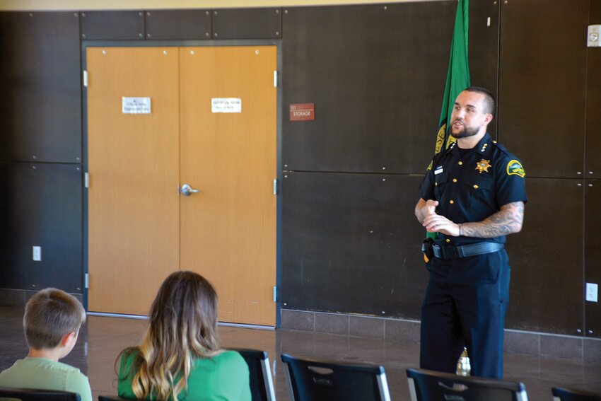 Jacon Dimond / For The Chronicle  Sheriff Derek Sanders discusses the proposed upcoming public safety sales tax initiative at the town house event on Oct. 4 at the Yelm Community Center.