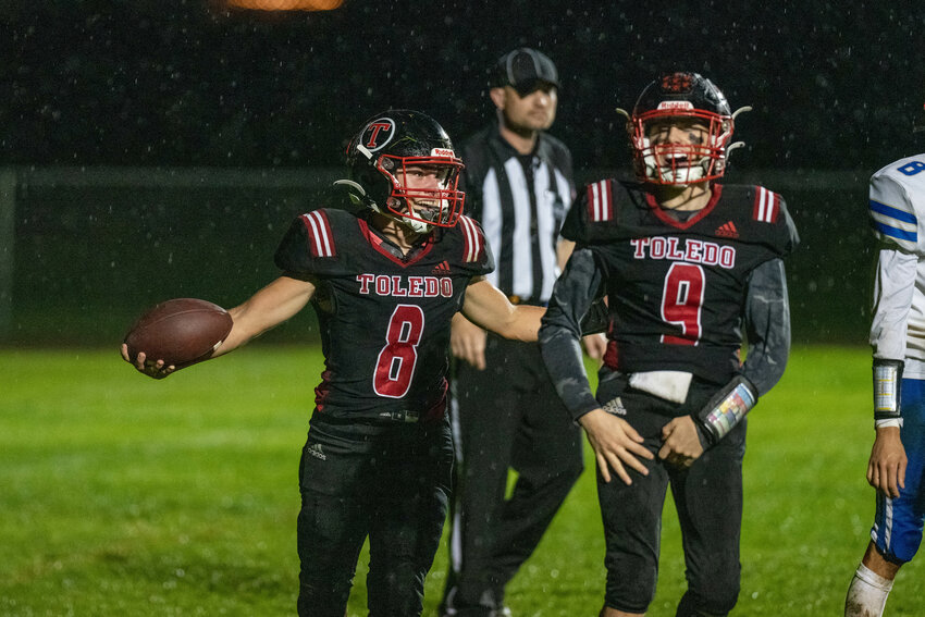 Toledo's Ethen Carver celebrates a touchdown in the first half of the Riverhawks' game against Adna on Oct. 13.