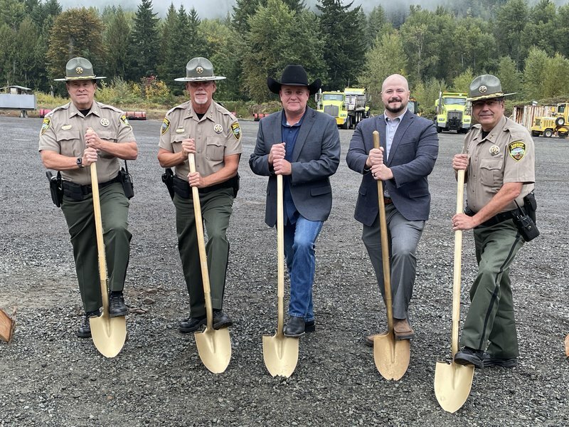 From left, Lewis County Sheriff&rsquo;s Office Captain Richard VanWyck, Sheriff Rob Snaza, Commissioner Scott Brummer, County Manager Ryan Barrett and Undersheriff Wes Rethwill are pictured at the groundbreaking of the new East Lewis County Sheriff&rsquo;s Substation near Randle.