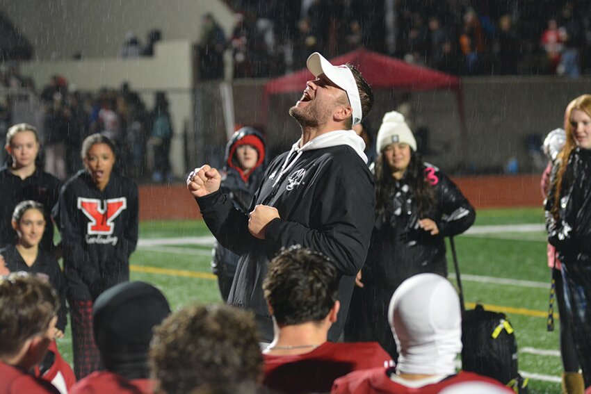Yelm football&rsquo;s special teams coordinator Daniel Caldwell celebrates the Tornados&rsquo; special teams performance on Nov. 3 after a 60-0 victory over Kent-Meridian.