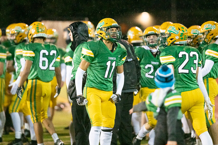 Payton LaGuerre celebrates after coming away with an interception in the third quarter of Tumwater's 70-12 win over Port Angeles in the first round of the 2A state tournament on Nov. 10.