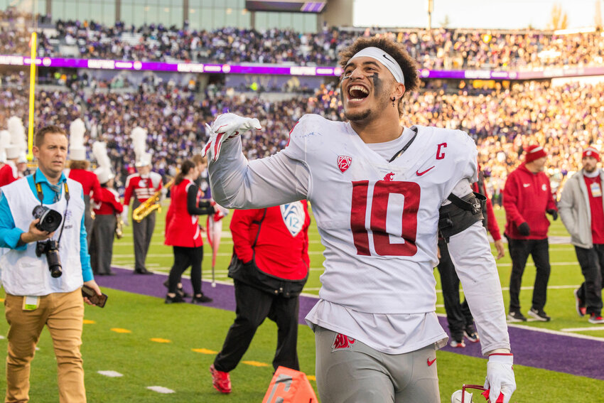 Cougars edge Ron Stone Jr. hypes up the crowd during a Boeing Apple Cup Series matchup against the University of Washington in Seattle on Saturday, Nov. 25.