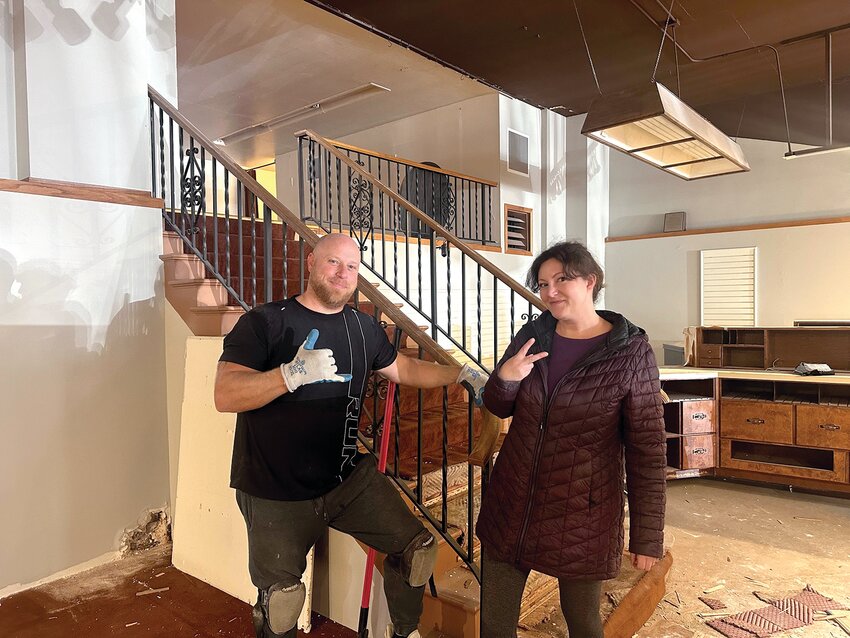 Frank and Danielle Pfannes are converting Bartel&rsquo;s previous retail space into the Northwest Salmon Smokehouse and Artisan Market. They are pictured here while working on the space last month in downtown Chehalis.
