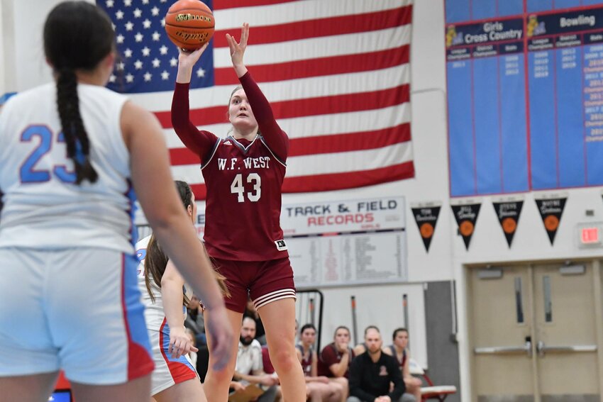 Julia Dalan takes a shot during W.F. West's 65-31 win over Mark Morris in Longview on Dec. 4.