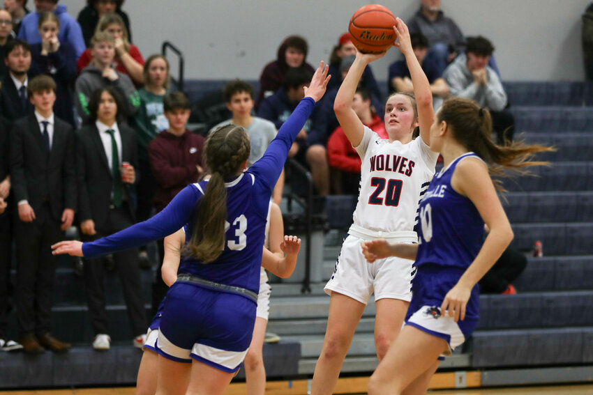Tyler Venable shoots over the outstretched arm of a defender during Black Hills' win over Eatonville on Dec. 4.