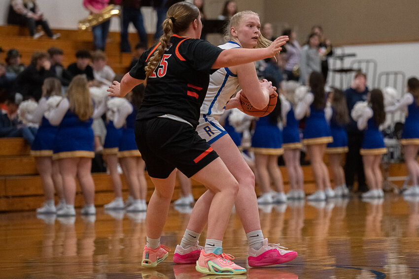 Delany Winter looks to pass during a 42-34 Rochester win over Centralia Dec. 12.