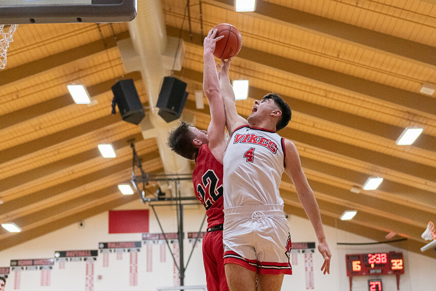 Cooper Fallon rejects Zack Munoz on his way up to the rim in the second quarter of Toledo's 65-45 win at Mossyrock on Dec. 21.