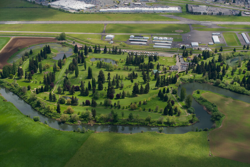 The Chehalis River winds alongside Riverside Golf Course and the Chehalis-Centralia Airport in the summer of 2022.