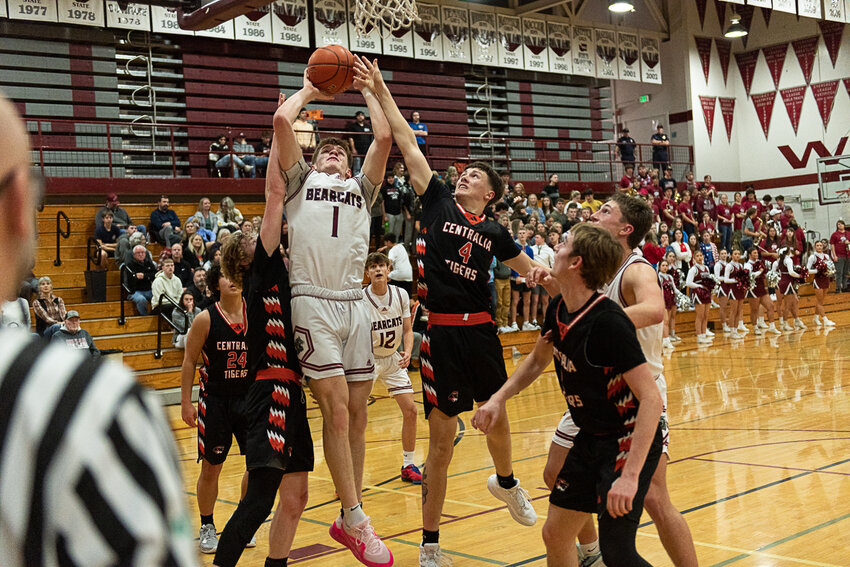 Parker Eiswald shoots over a defender underneath during W.F. West's win over Centralia on Jan. 4.