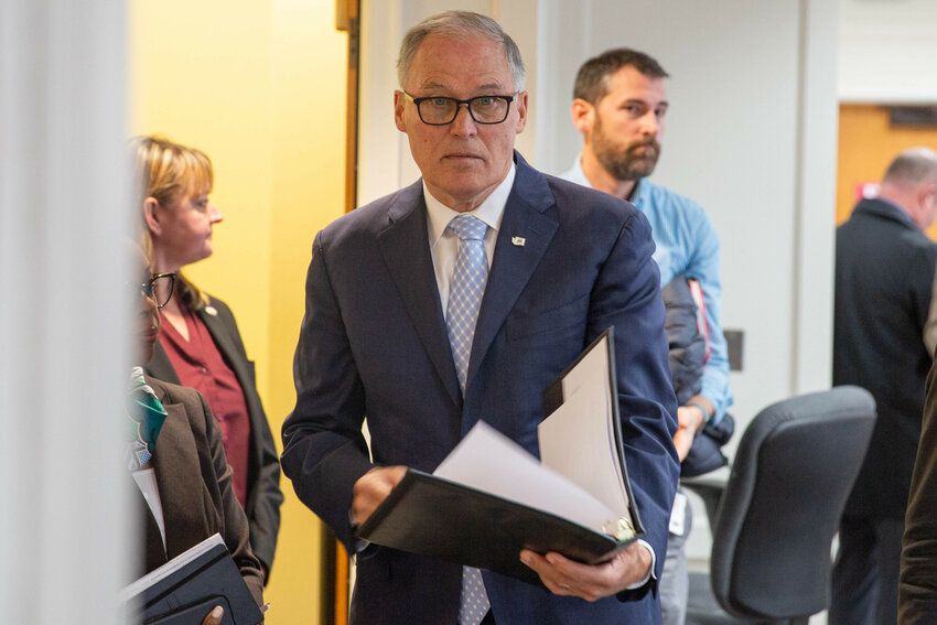 Gov. Jay Inslee appears for a media briefing to mark the Jan. 8 start of the new legislative session on Thursday at the Capitol campus in Olympia.