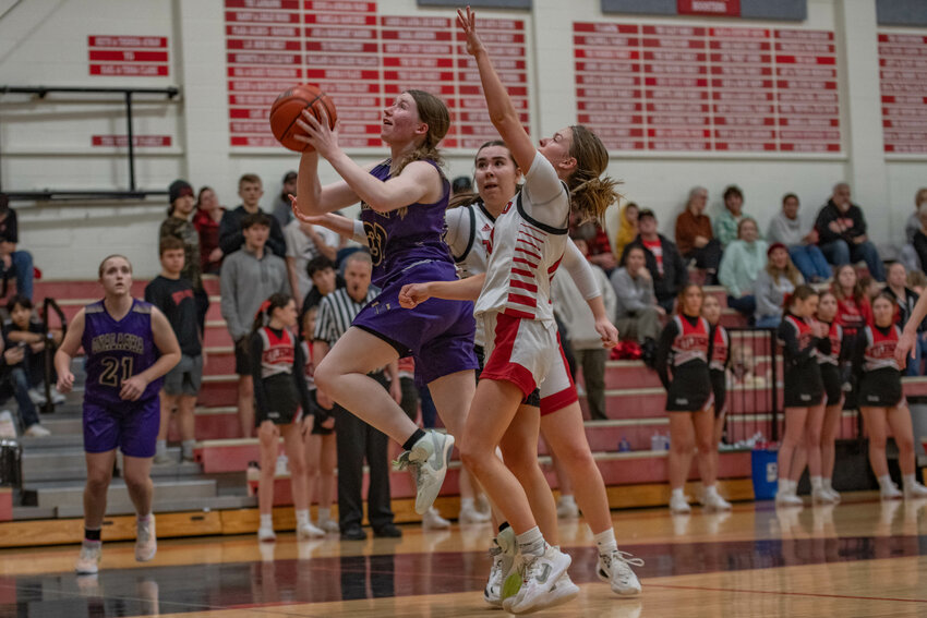 Cierra Berg drives to the hoop during a 34-27 Onalaska win over Toledo Jan. 22.